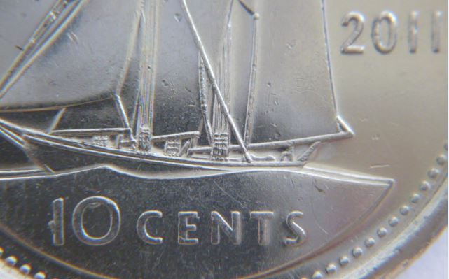 10 Cents 2011-Éclat de coin sur 1 et dans le 0 de 10 cents-1.JPG