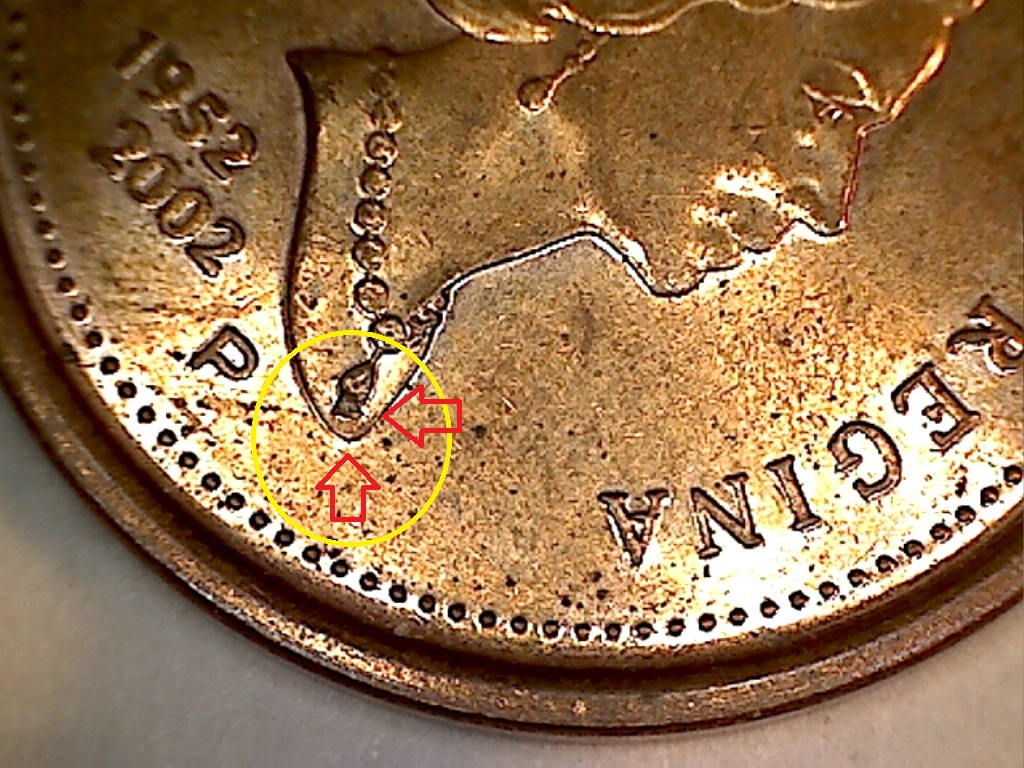 2002 P Éclat sur pendentif B019131C.jpg