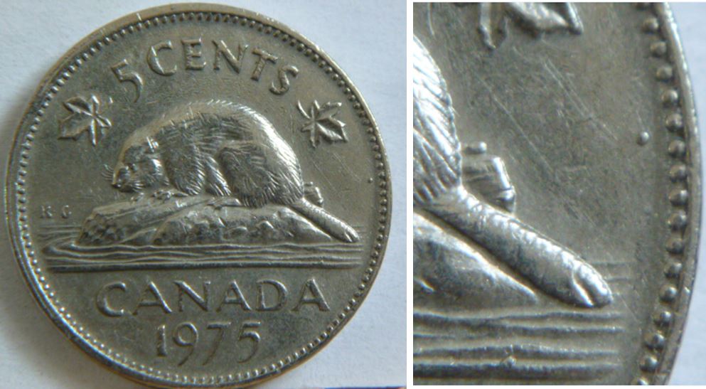 5 Cents 1975-Deux éclats de coin et un beau point-Coté revers-1.JPG