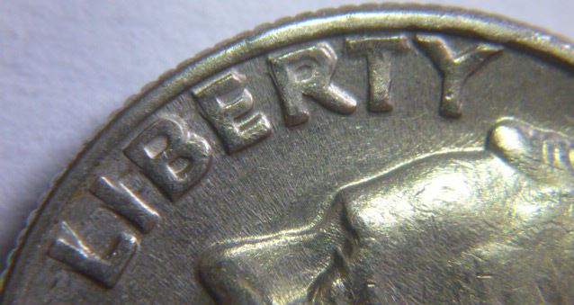 10 Cents USA 1979-Double date+lettrage-Coin détérioré-4.JPG
