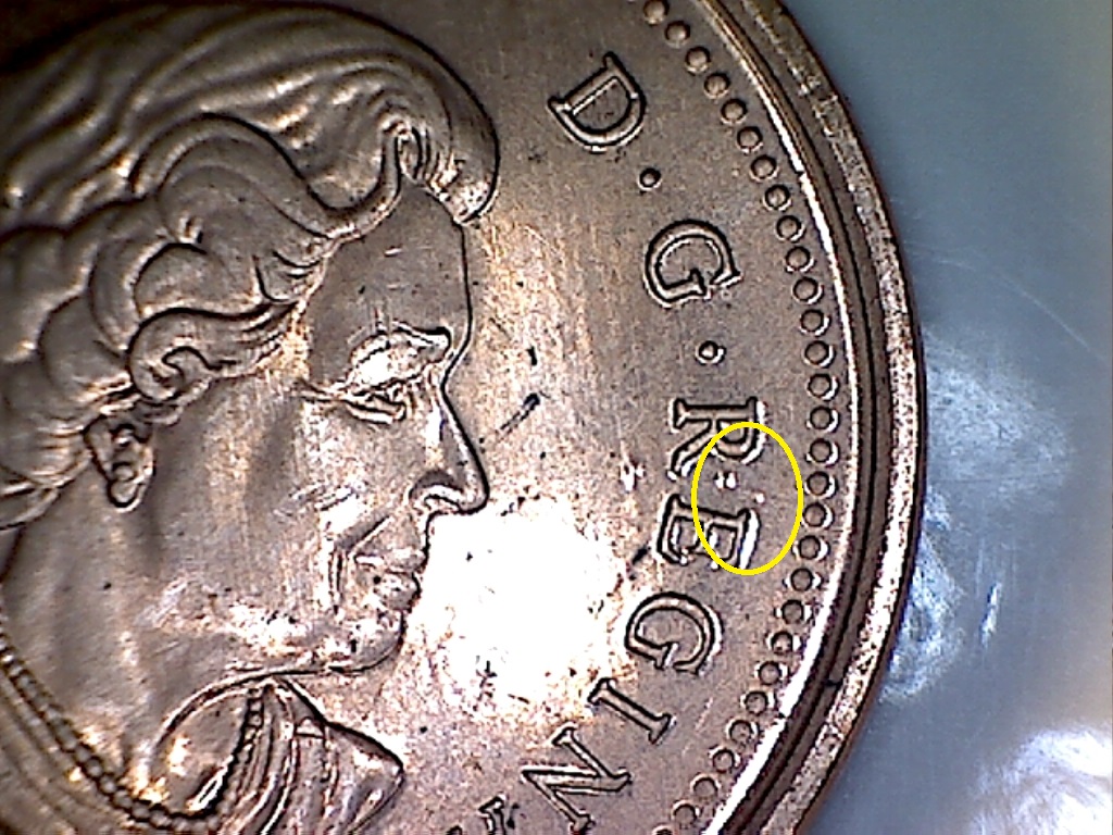 2005 Points sous la Reine et entre RE de REGINA B019222B 3 de 5.jpg