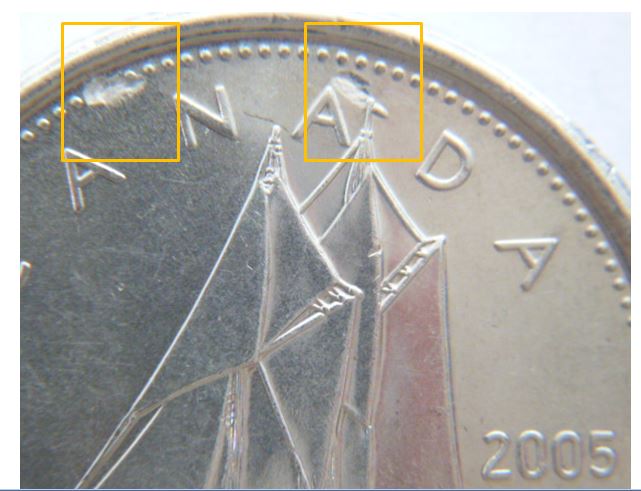 10 Cents 2005P-Frappe a travers graisse revers-1.JPG