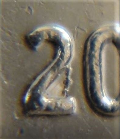 10 Cents 2003-Éclat coin dans le 2 de la date-2.JPG
