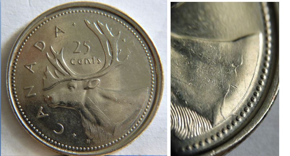 25 Cents 2002-Coin fendillé sur caribou-1.JPG