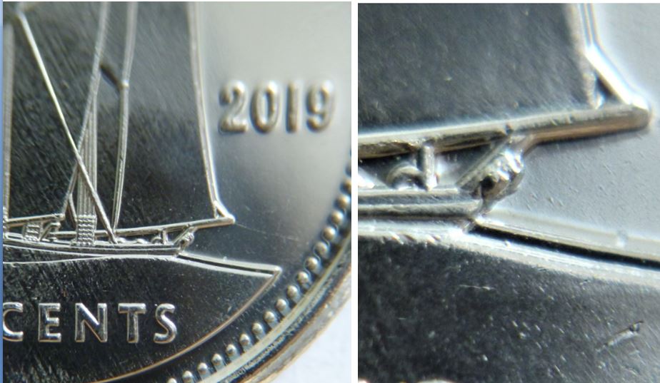 10 Cents 2019-Éclat du coin sur le cable de la poupe.JPG