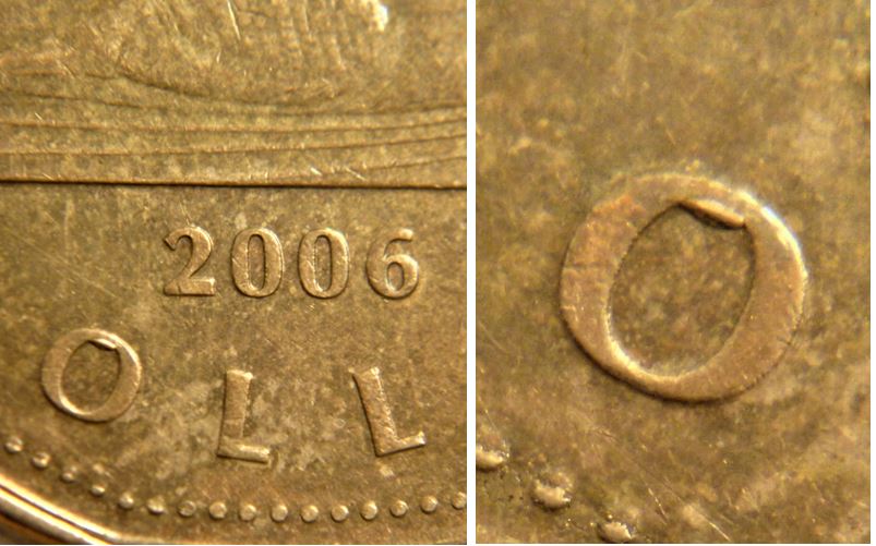 1 Dollar 2006-Éclat du coin dans le oO de dOllar.JPG