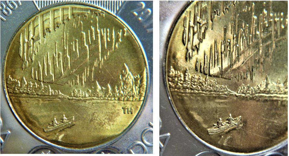 2 Dollar 2017 -Une baleine derrière le canot-Éclat coin -Coin fendillé-1.JPG