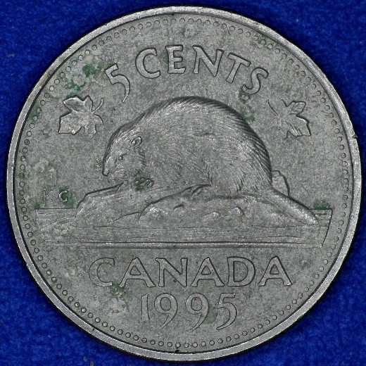 5¢ 1995 dommage outil rev-1.jpg