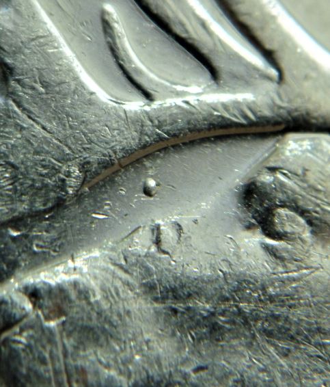 25 Cents 2006-Point entre le nez et les cornes-1.JPG