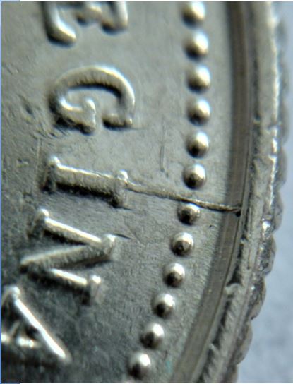 10 Cents 1992-Coin fendillé au sessus du I de regIna-1.JPG