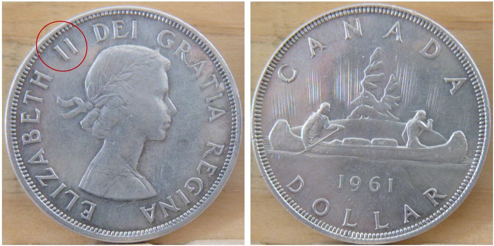 1 Dollar 1961 - Fendille coté avers -II- de elizabeth II-1.JPG
