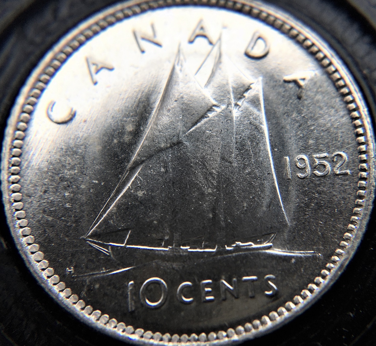 10 cents 1952 revers double 19 40.jpg