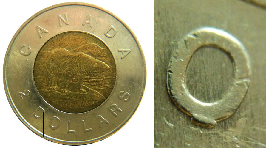 2 Dollars 2011 MRC logo-Éclat coin sous O de dOllars-No.1.JPG