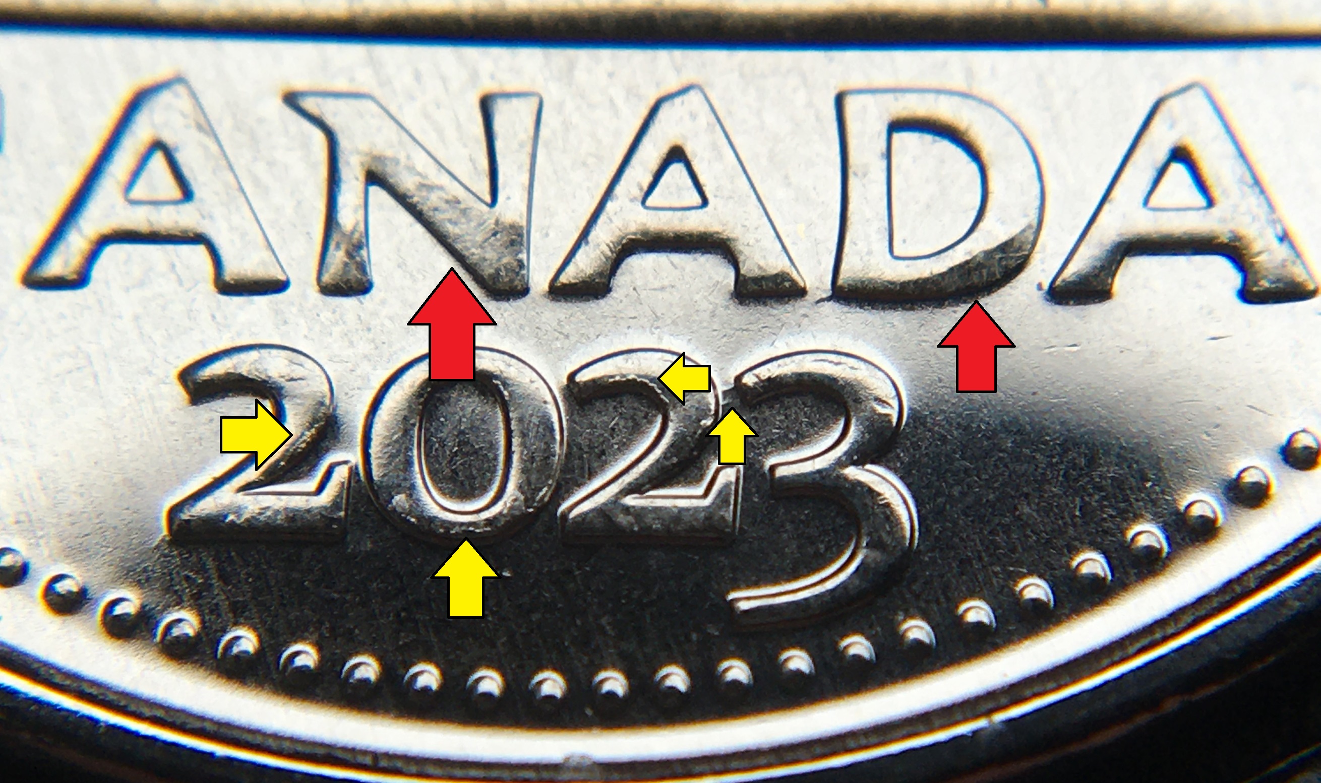 5 cents Canada avec flèches.jpg