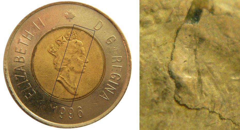 2 Dollars 1996-Défaut de placage coté avers-1.JPG