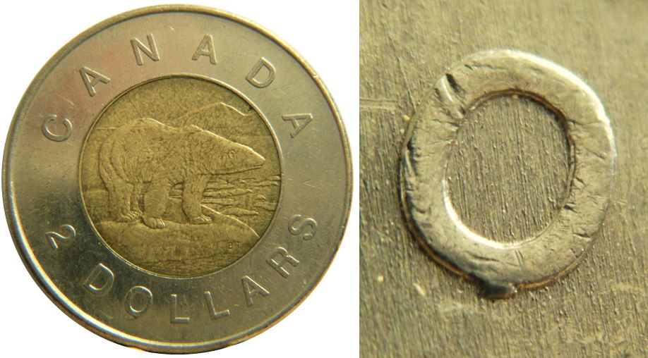 2 Dollars 2005-Éclat coin sous O de dOllars-2.JPG