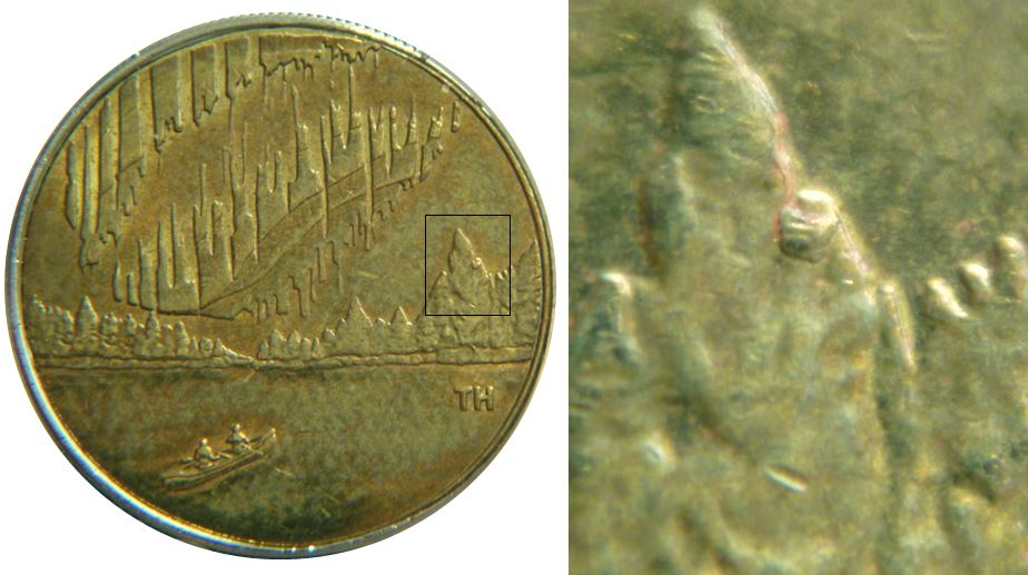 2 Dollars 2017-Éclat coin dans l'arbre-1,.JPG