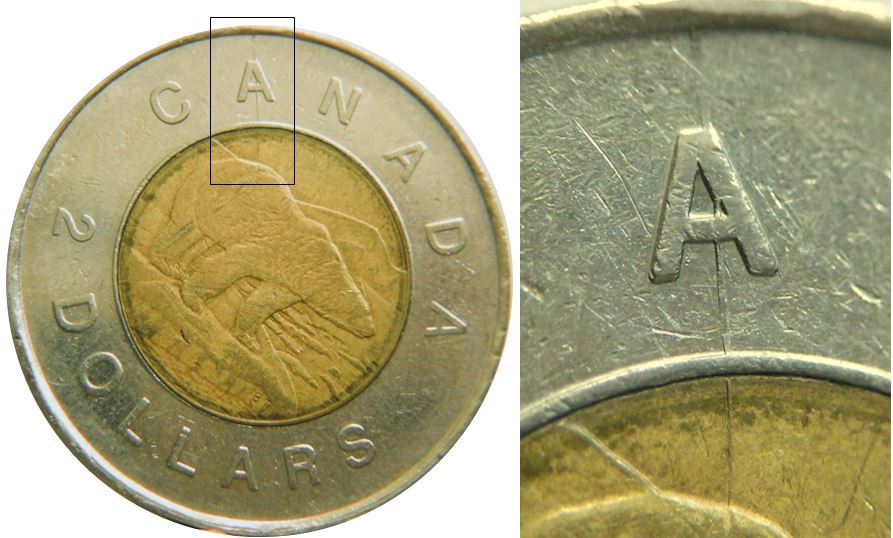 2 Dollars 1996-Coin fendillé à travers A de cAnada-1.JPG