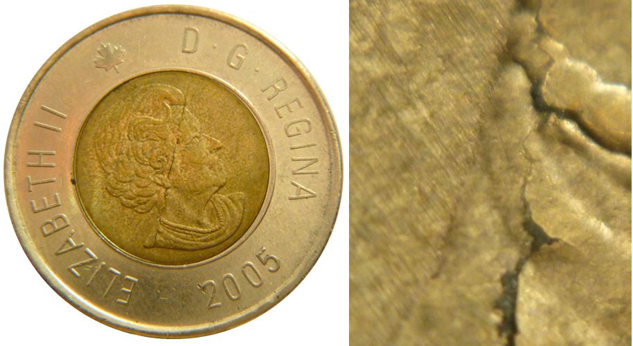 2 Dollars 2005-Défaut du flan coté avers-1.JPG
