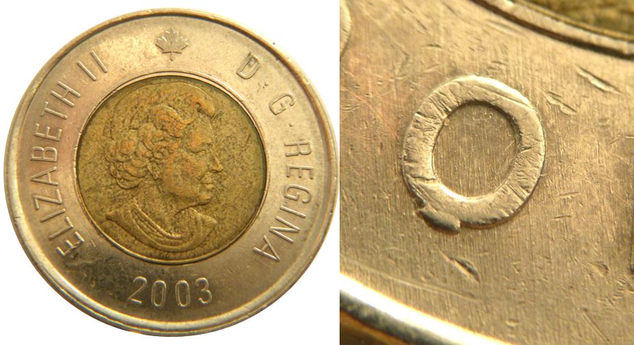 2 Dollars 2003-Pedestal O de dOllars-Éclat coin sous le O dOllars-1,.JPG