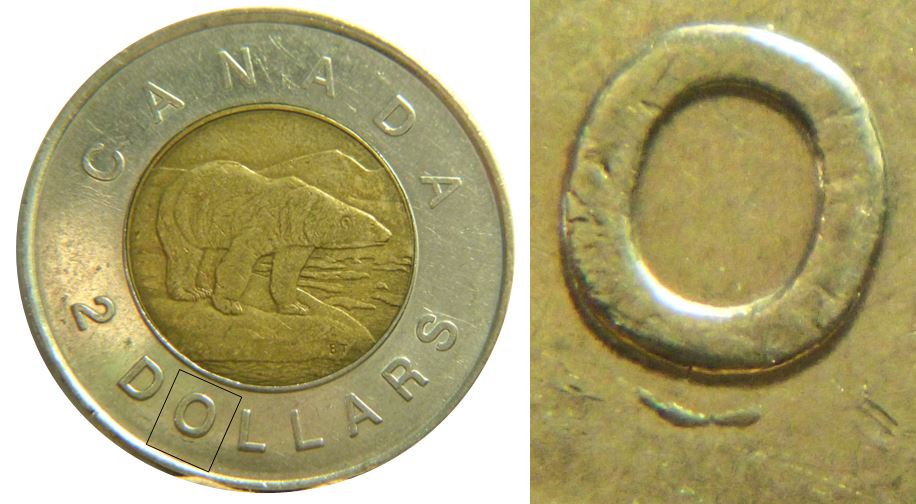 2 Dollars 1996-Éclat coin sous O de Dollars-1.JPG