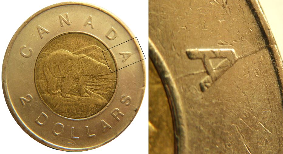 2 Dollars 2009-Coin fendillé dernier A canadA-1.JPG