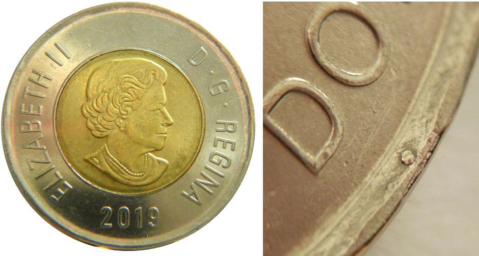 2 Dollars 2019-Point sous D de Dollars-1,.JPG