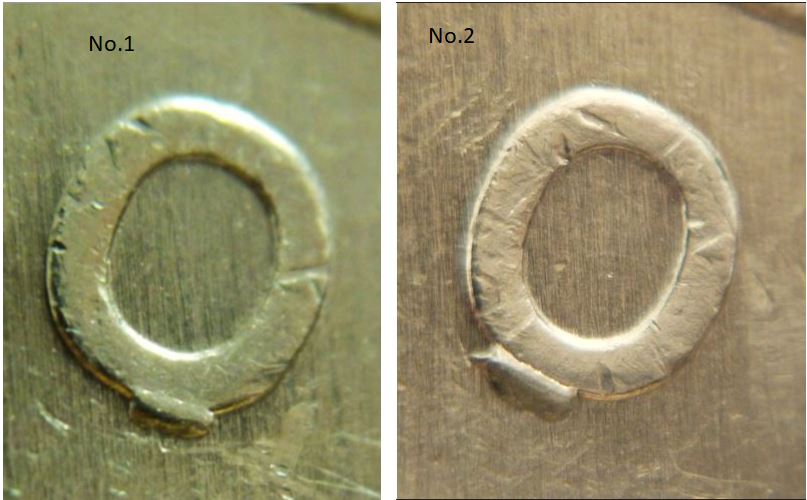 2 Dollars 2011 W-Éclat coin sous O de dOllars-N,.2.JPG