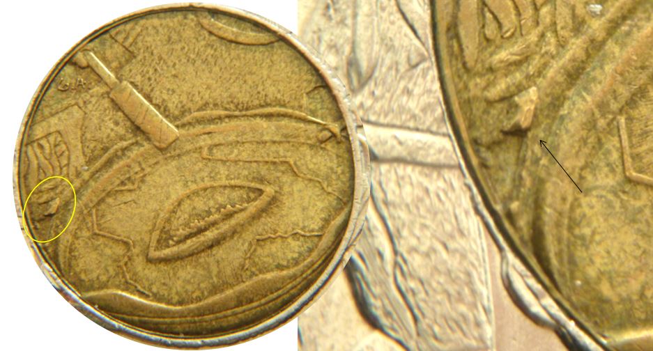 2 Dollars 1999-Éclat coin sous le tambourin-1.JPG