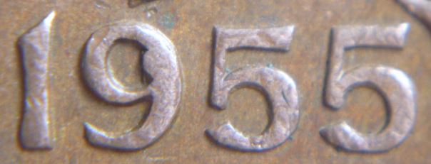 1 Cent 1955-Éclat coin dans le  9-2.JPG