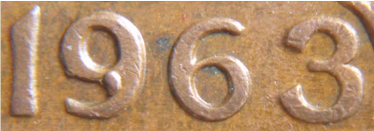 1 Cent 1963-Éclat coin sur le  9-2.JPG