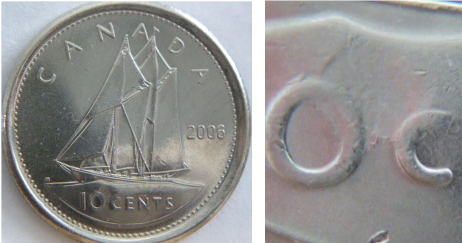 10 Cents 2006-Frappe a travers 0C de 10Cents-1.JPG
