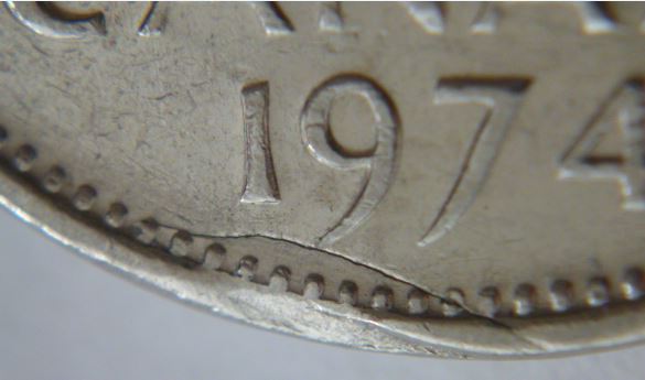 5 Cents 1974-Flans presque coupés revers-1.JPG