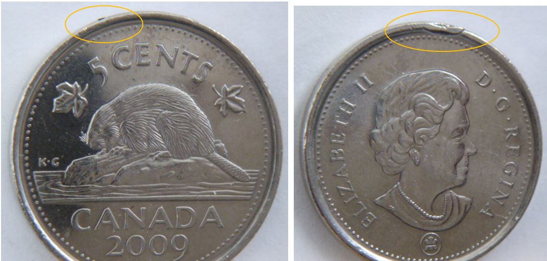 5 Cents 2009-Surplus de métal -La bavure repliée sur la tranche-1.JPG