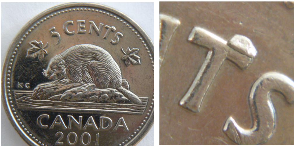 5 Cents 2001- Éclat de coin sur T de cenTs.JPG