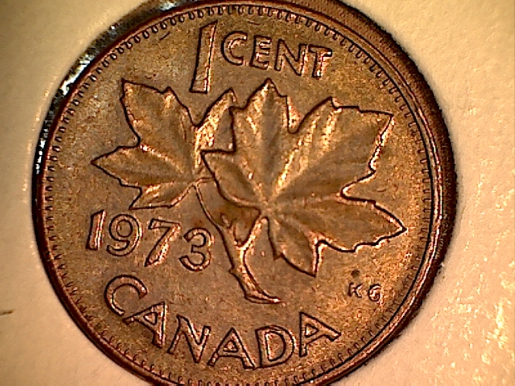 1973  Coin fendillé entre le 2e A et le D de CANADA Revers.jpg