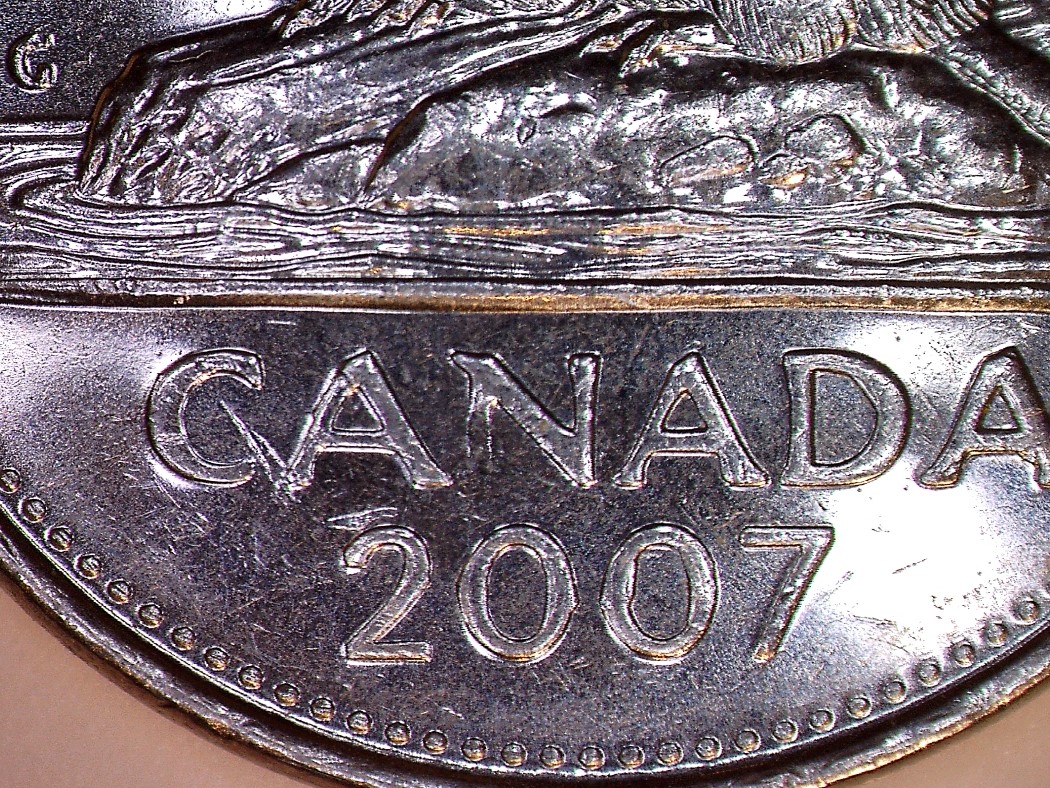 Coin obturé N&E et planchet flaw 2007 zm red.jpg