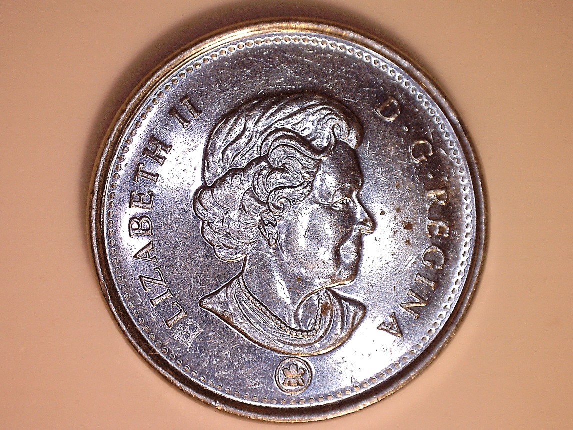 Coin obturé N&E et planchet flaw 2007 o red.jpg