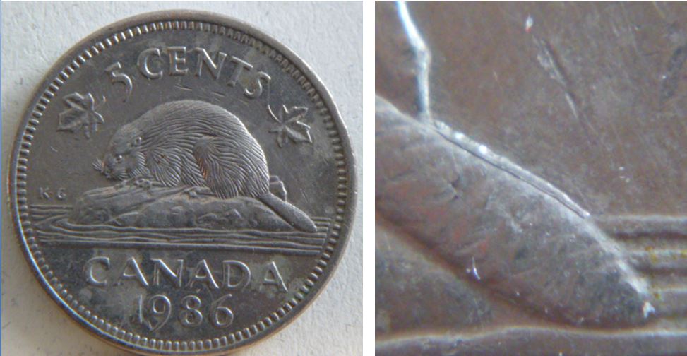 5 Cents 1986-double queue-coin détérioré-1.JPG