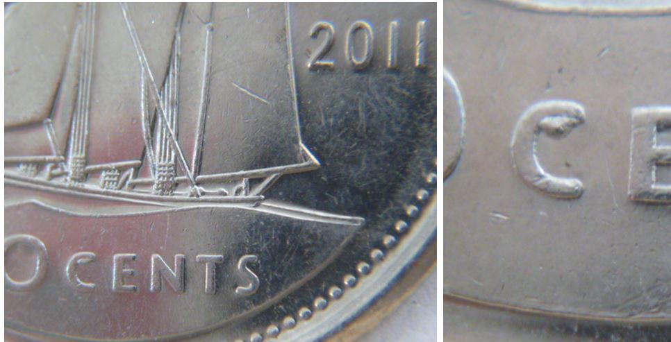 10 Cents 2011-Éclat de coin sur C de Cents.JPG