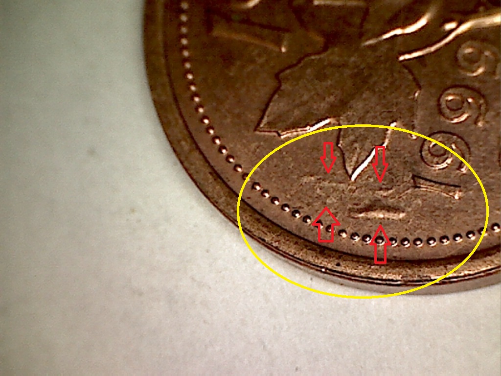 1999 Dbl. 3e  9, défaut de coin et fissure sur le 1 B019068C 2 de 3.jpg