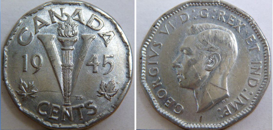 5 Cents 1945- Coin fendillé sous 19 et a travers le flambo-1.JPG