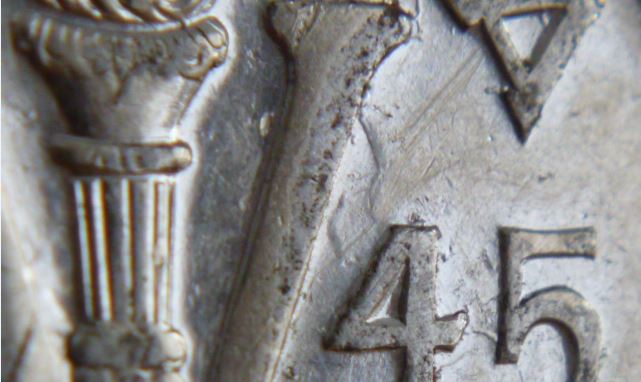 5 Cents 1945-Coin entrechoqué revers-4.JPG