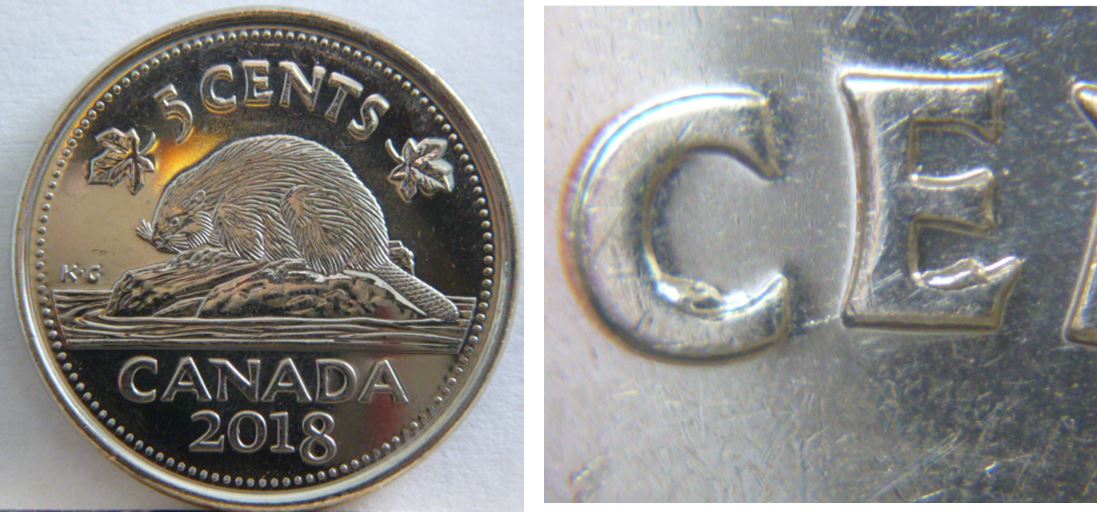 5 Cents 2018-Éclat de coin dans le CE de CEnts.JPG