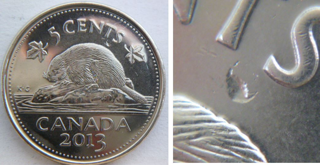 5 Cents 2013-Défaut de flan sous le TS de cenTS.JPG