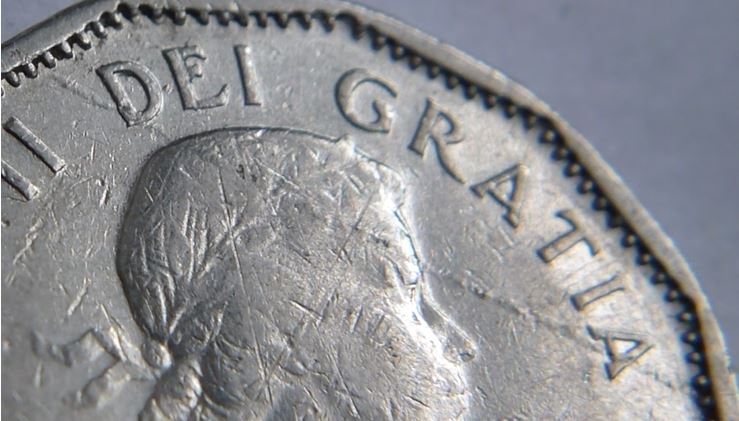 5 Cents 1958-Dommage du coin coté avers-2.JPG