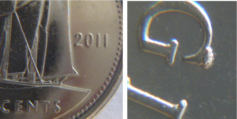 10 Cents 2011-Éclat de coin sur G de reGina.JPG