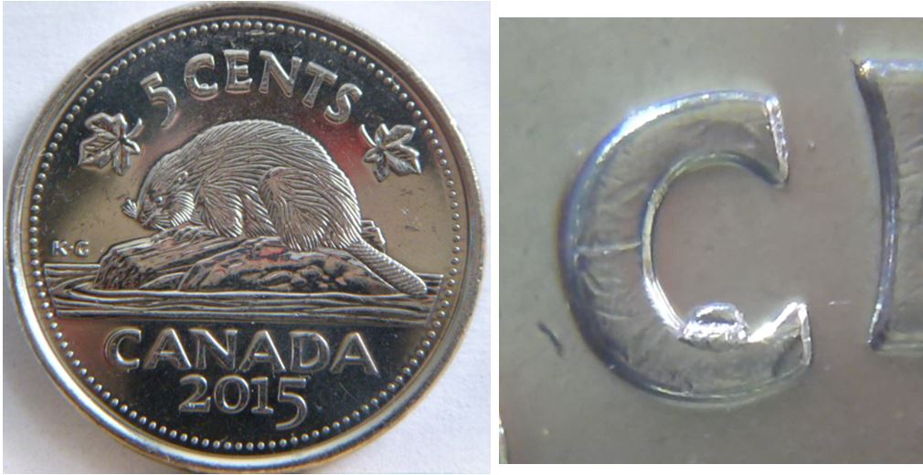 5 Cents 2015-Éclat du coin dans le C de Cents.JPG