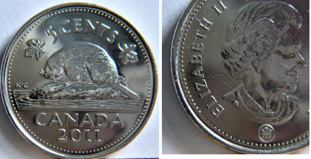 5 Cents 2011-Dommage du coin coté avers entre les lettres-1.JPG