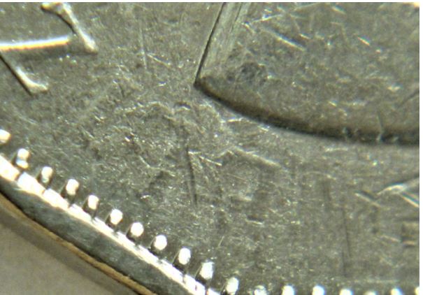 5 Cents 1962-Coin obturé sur ELI de ELIzabeth-2.JPG